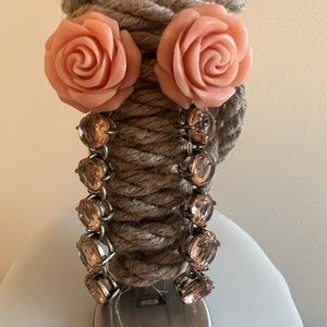 Stunning pair of Kate Spade rose drop earrings with pink CZ.